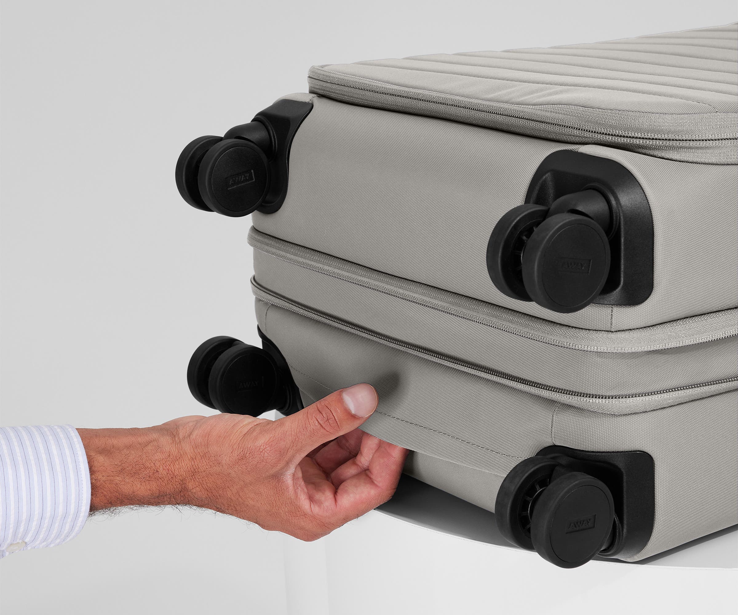 The Softside Bigger Carry-On in Cloud Gray - Image 9